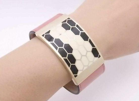 Hermes New Serpenti wide Bracelet. Blush Pink Leather, White/Brown/Black Enamel and Gold Hardware