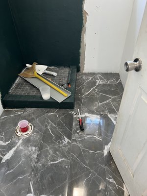 Tile and water proofing work for a 1st level bathroom.