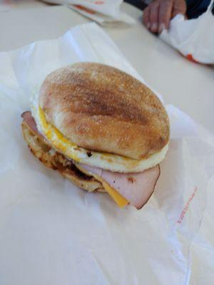 Ham egg and cheese on English muffin