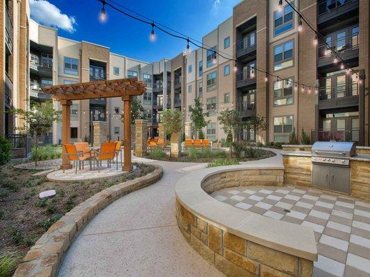 Courtyard with grill and lounge areas