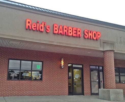 Reid's Barber Shop. "A Grand Blanc tradition since 1920".