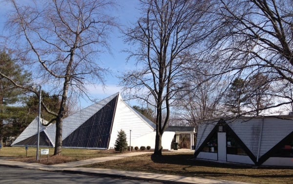 Church sanctuary on left; education bldg (with Preschool and Wellness Center operations) on right.