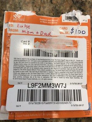 Home Depot gift card, with glue over the card number and PIN.