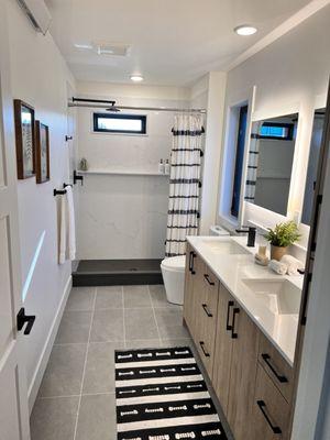 Full bathroom shower and countertops.