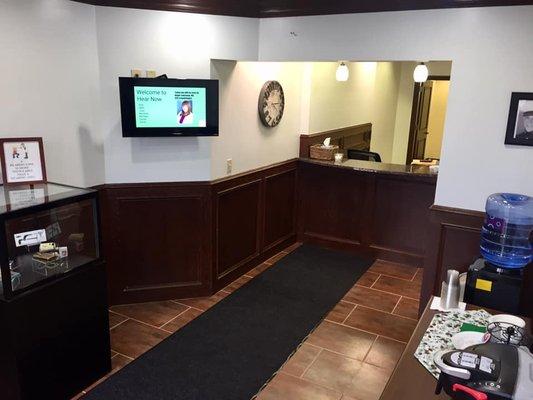 Our entrance contains our refreshment station and check in at our front desk!