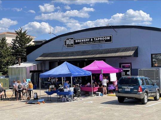 Taproom entrance is on W 1st street at rear of bldg!