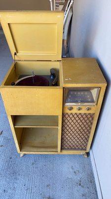 Original vintage record console.