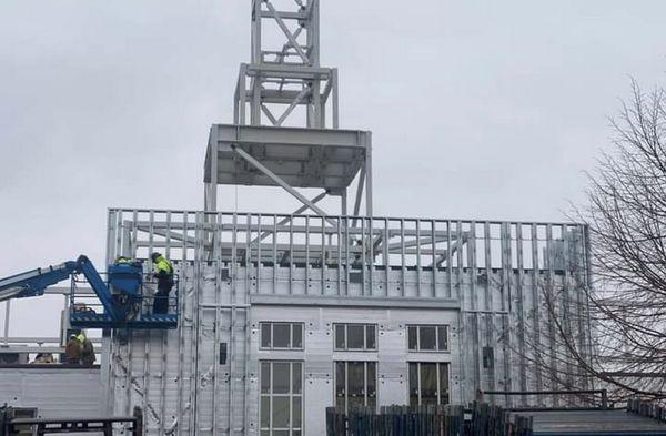 Helena Montana Temple, more pictures, and videos found on templevideos.com, and templescoop.com. Frame being installed.