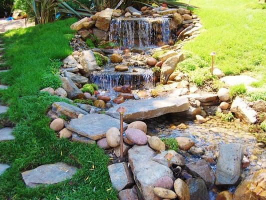 Sierra Pacific Design - Custom waterfall designer and pond builder.