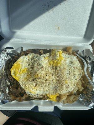 Steak and eggs platter w black pepper