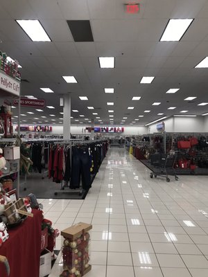 View of clothing section(left), accessories(right), shoes (straight ahead).