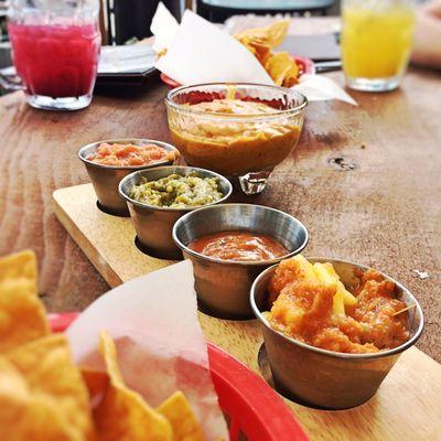 Salsa flight with queso and chips at Trackside Tacos in Somersworth, NH.