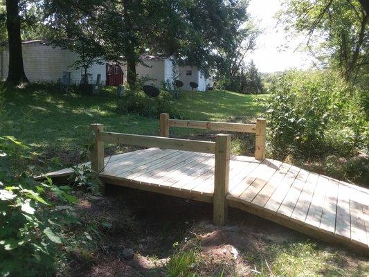 Recent project. Building a small bridge. I also build decks, fences, painting, drywall,  someflooring, siding, and more.