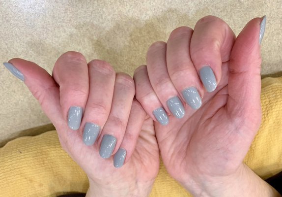 Mani by Esther :) The color is actually gray.  It appears on the bluish side in the photo.