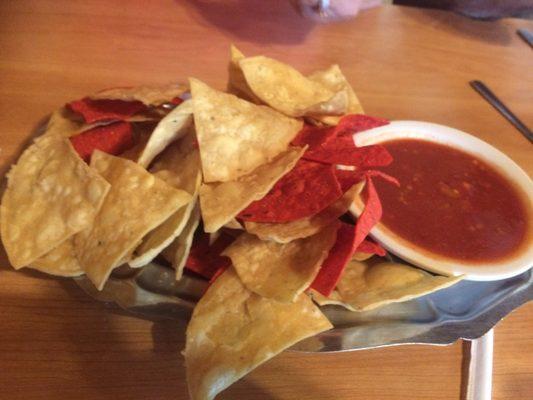 Garlic rich salsa & warmed chips.