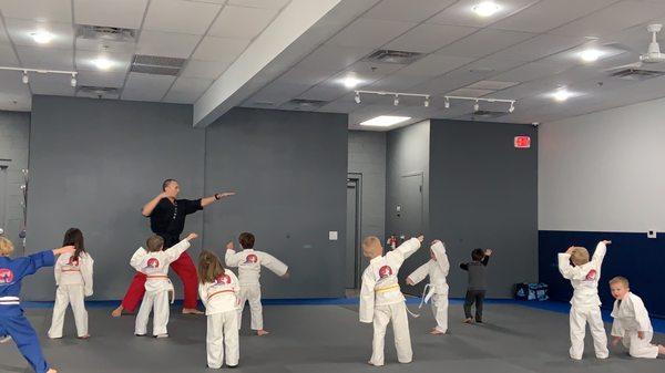 Master C instructing the little dragon's