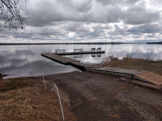 This is the boat launch just to the left of a very small dock