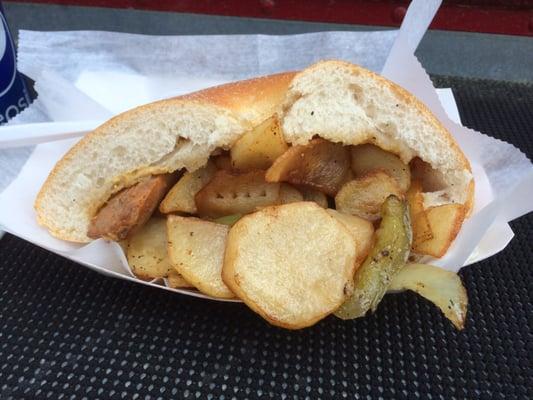 Hot Sausage on pizza roll with peppers and fried potatoes