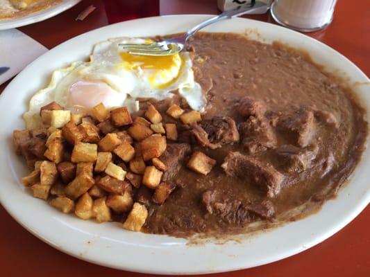 Carne guisada breakfast with 2 over medium eggs & fresh flour tortillas. Yum!!!  Salsa w xtra spicy.