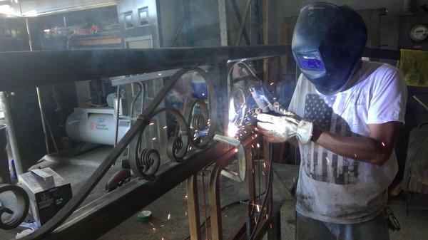 decorative gate bein welded at the shop