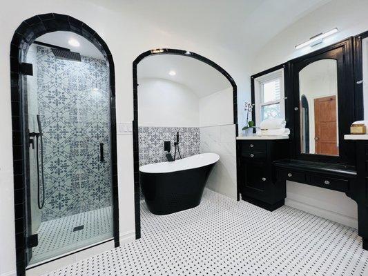 modern master bathroom with traditional elements to preserve the original look of the house.