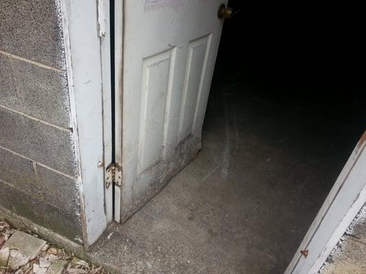 The security door to the garage had been kicked in multiple times the lights nor plugs in the garage worked