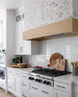 White Countertops with white subway tile backsplash.