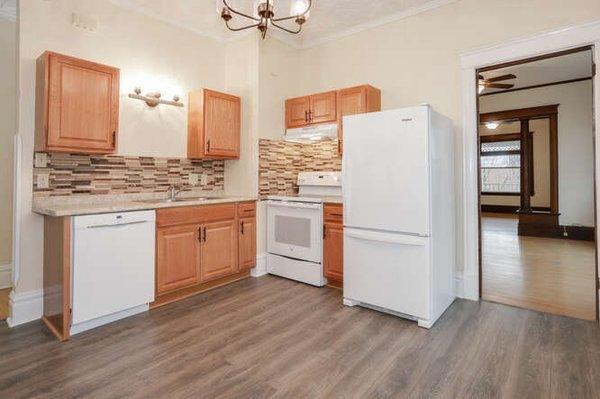 New appliances in large kitchen with a dishwasher...Nice!