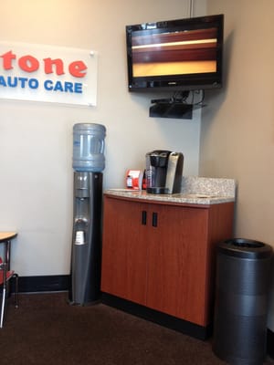 Nice waiting area with chairs, tables, Keurig, water and Direct TV!