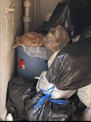 TRASH ROOM AT THEIR PROPERTY KIMBROUGH TOWERS THAT HAS NOT BEEN EMPTIED IN WEEKS.