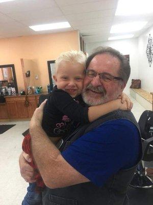 My brother granddaughter Caroline. First hair cut.