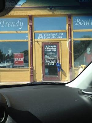 It's a boutique and alterations shop located in the shopping center