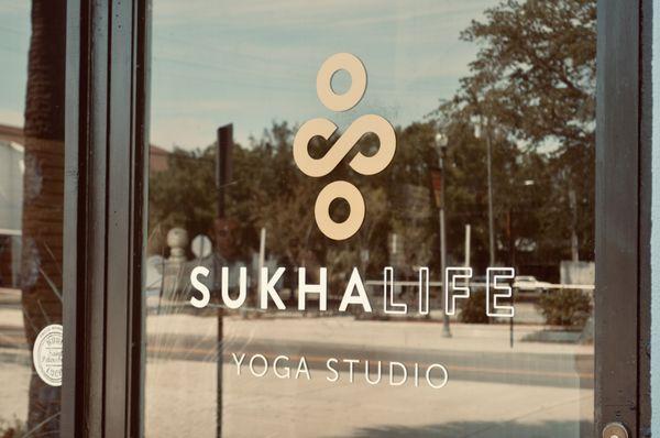 SukhaLife Yoga Studio front door on Central Avenue in St. Petersburg.