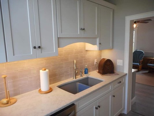 Cloud 9 Spectrum Quartz countertops by B.C. Stone and beautiful custom cabinets by Justin at Buterbaugh Kitchens