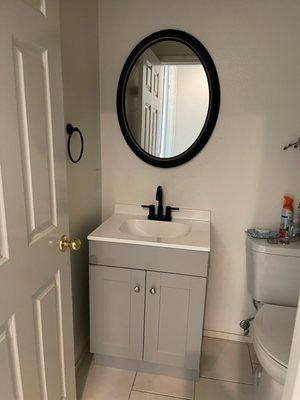 Made this bathroom look new by installing this brand new vanity.