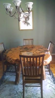 5'5" X 4'5" x 7" California Buckeye dining room table with Cypress chairs. The legs of the table are 17" cypress poles.