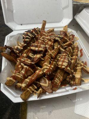 Our fries with cut hotdog and bacon