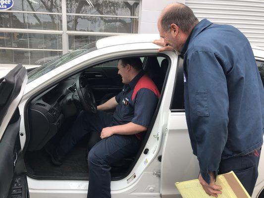 Jeff and his son Hunter checking for issues on our Honda Accord.