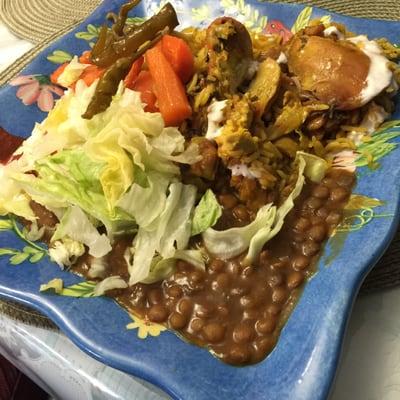 Rice, chicken, veggies, lentil soup, salad and white sauce