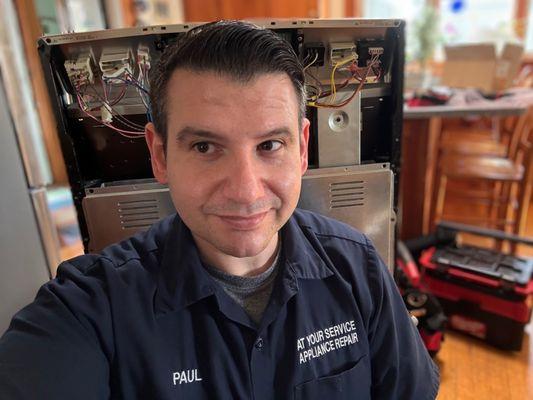 Paul (owner and technician) replacing the control board and sensor on an Electrolux built Kenmore electric range.