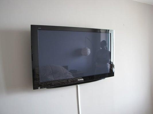 PLASMA - WALL MOUNTED WITH HDTV CABLE BOX