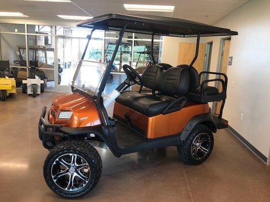 Atomic Orange Lifted Club Car Onward Four Passenger with Custom Seats