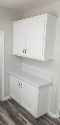 MV Custom Cabinets made and installed the upper cabinet to match the lower base cabinet.