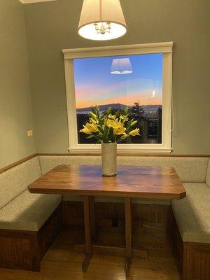 Kitchen nook banquette and trestle table custom designed by Berkeley Mills