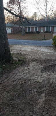 This is my neighbors yard. They drove over the water meter and water/ sewer lines