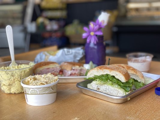 Potato salad, Mac n' Cheese, Virginia Baked Ham, Chicken Salad, Rice Pudding