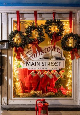 The Goffstown Main Street window decorated for Christmas