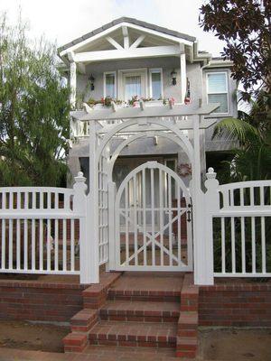 Painted fence and white trim in Coronado