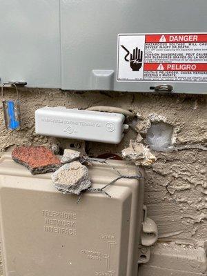 Stucco damage. Broken tiles were found all over yard