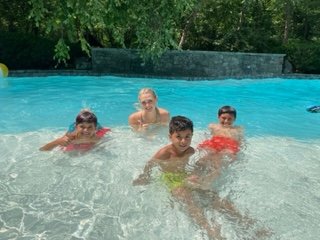 Soccer players improving their swim skills.